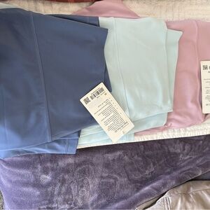 lululemon athletica Leggings in Blue, Light Blue, and Pink. 3 pair of leggings!!